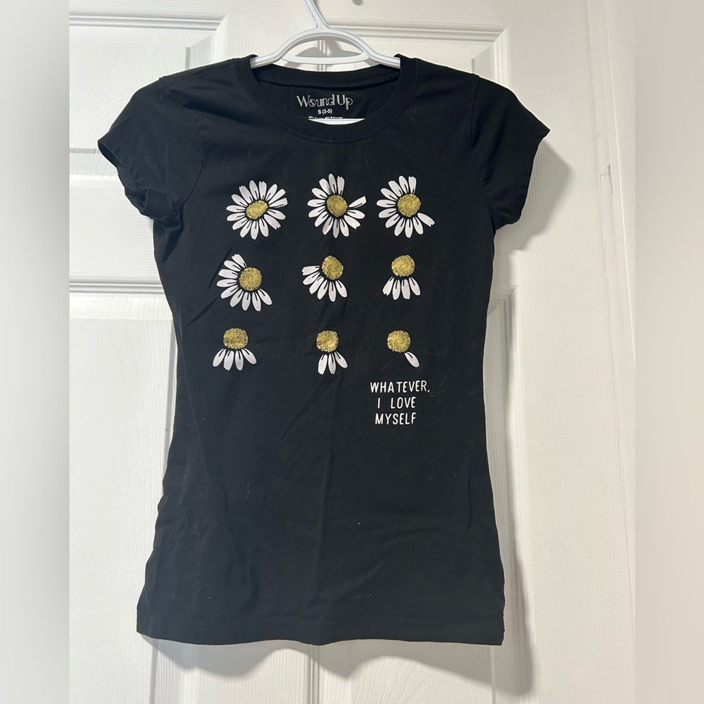 Wound Up Black Tee with Daisy Graphic